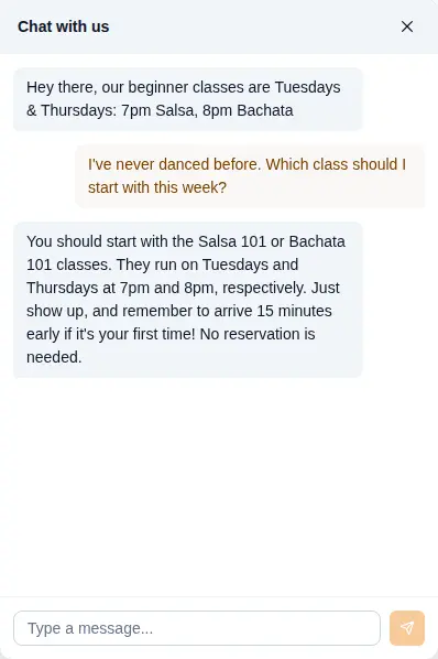 The Aatma Dance website chat recommending beginner Salsa 101 and Bachata 101 to a first-time visitor.